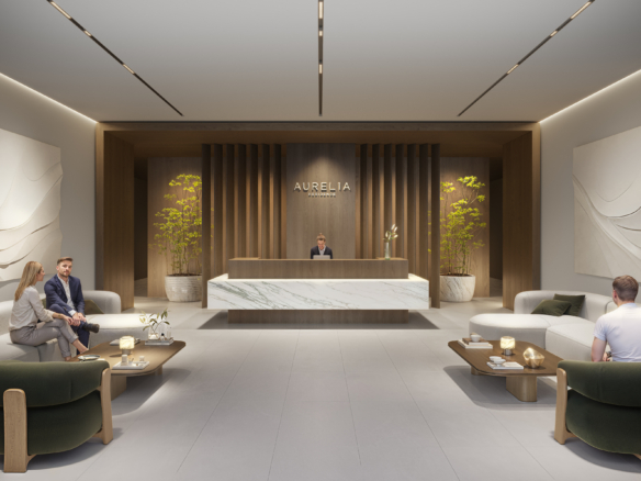 Hotelachtige lobby met zitjes en receptie in AUREL1A Residence Dubai Sports City