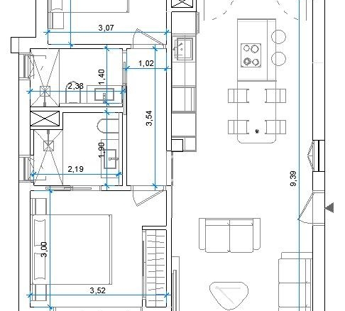 Floor plan of an apartment showing living area with sofa and dining table, kitchen island, two bedrooms, bathroom and hallway with dimension marks.