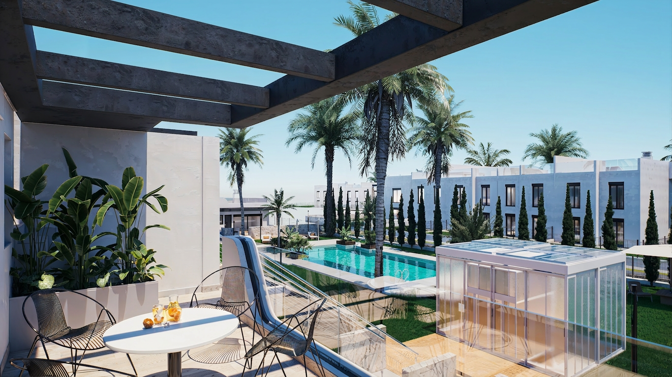 Sunny outdoor pool area at a modern resort with palm trees, glass railings, and a terrace with seating and a drinks table.