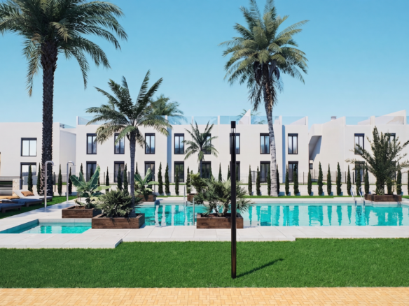 Modern resort courtyard with a rectangular turquoise pool, white buildings, and tall palm trees under a clear blue sky. Six lounge chairs line the pool deck.