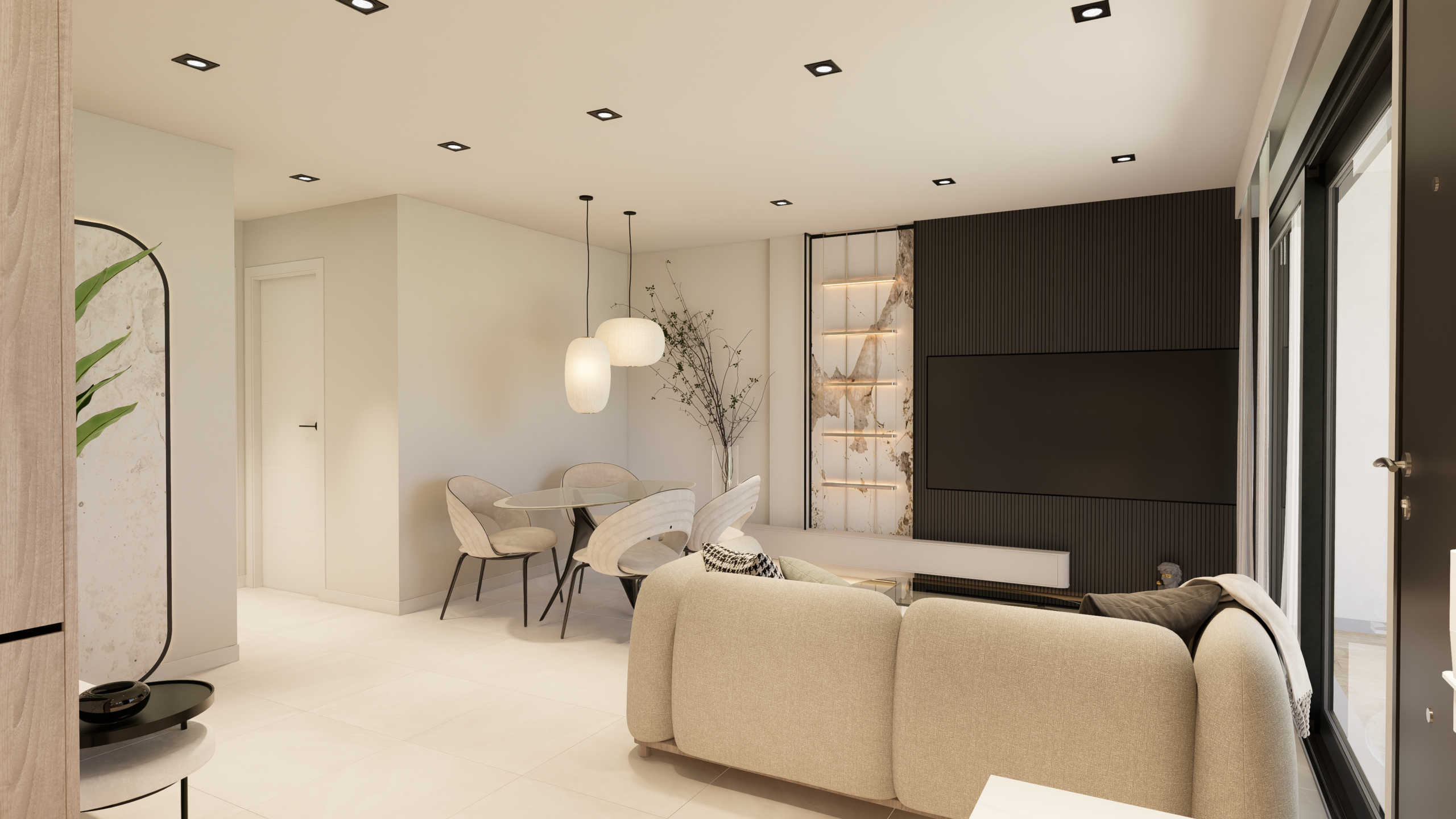 Open-plan living area with beige sectional sofa, glass dining table, and two pendant lights in a bright, modern room.