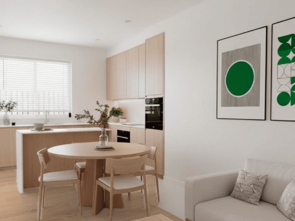 Open keuken met kookeiland en eethoek in modern appartement in Los Alcázares