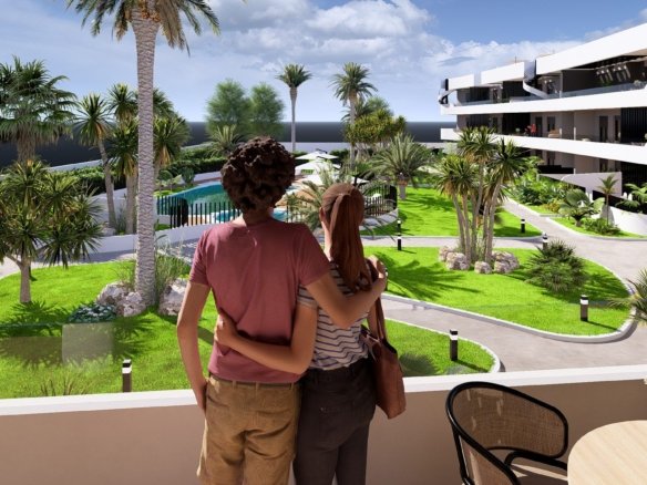 Terras met uitzicht op het zwembad en de tropische tuin in Los Alcázares