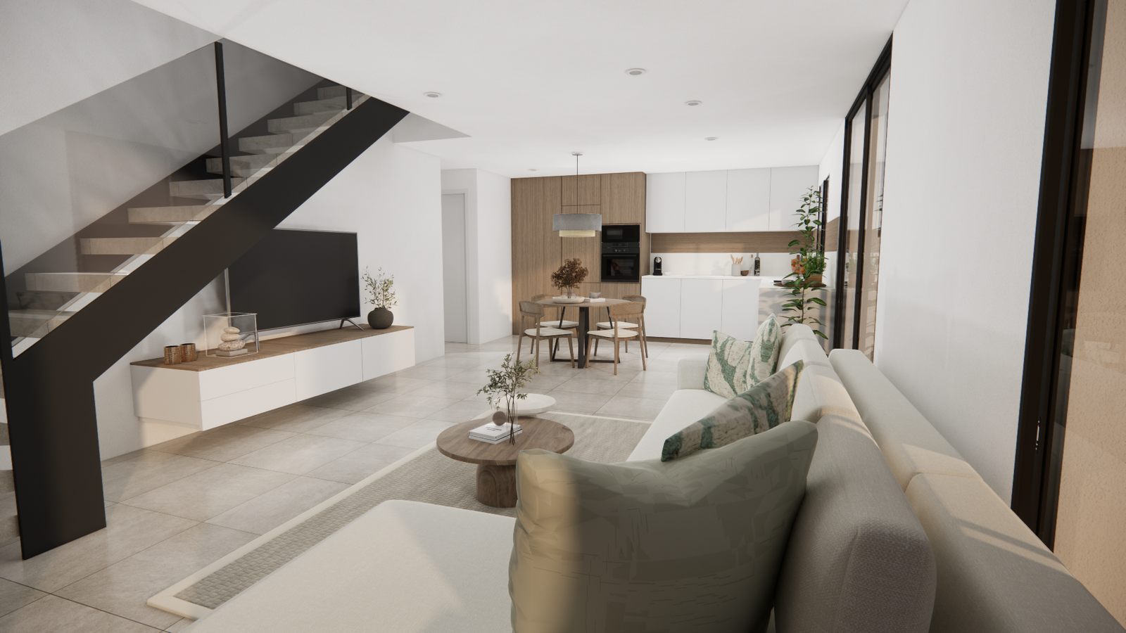 Ruime woonkamer met hoekbank, open keuken, eethoek en moderne zwarte trap in de nieuwbouwvilla.