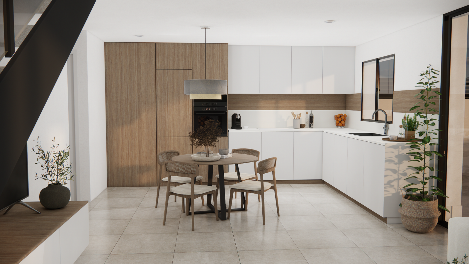 Open keuken en eethoek met houtaccenten, inbouwapparatuur en veel natuurlijk licht in de villa.