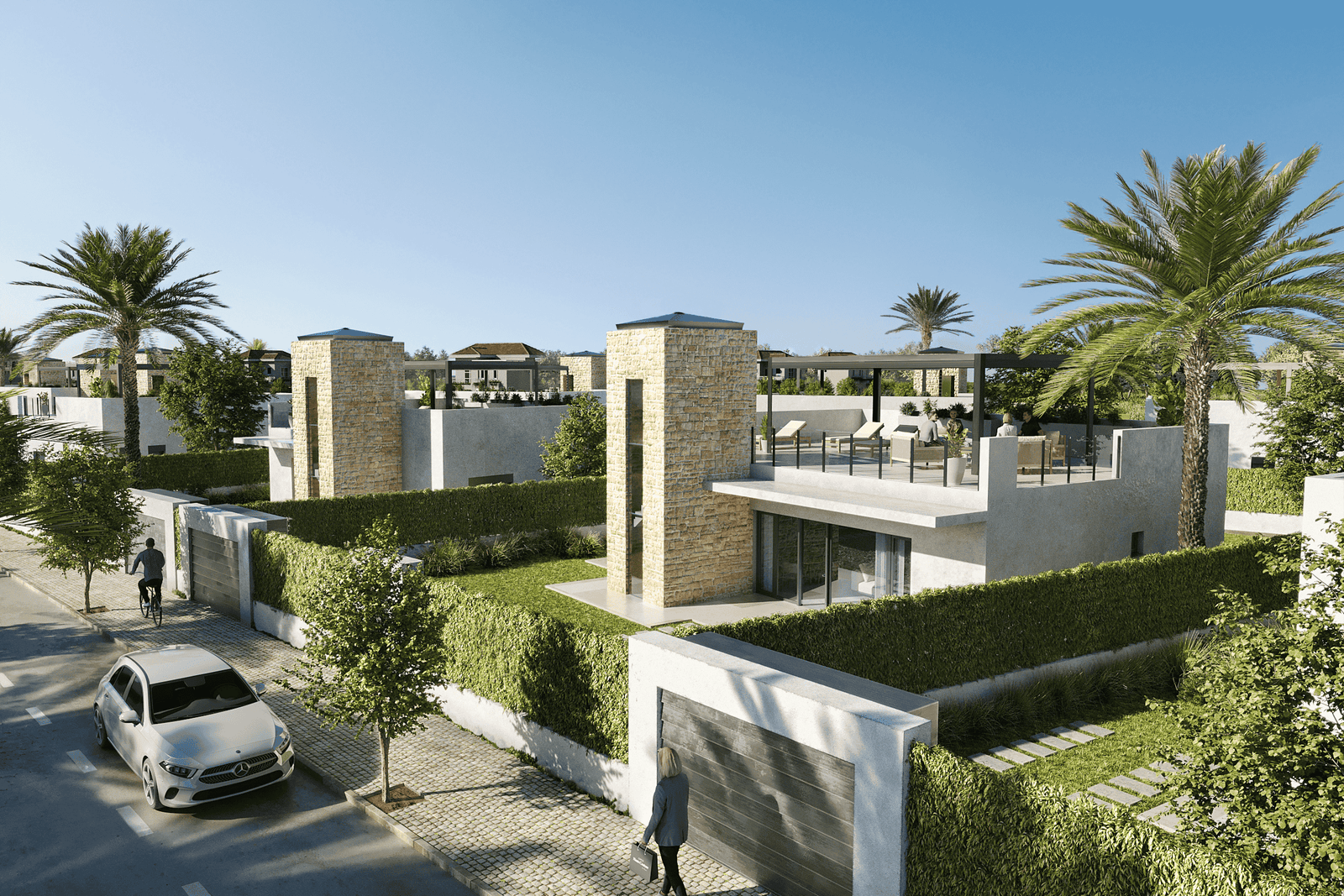 Straatbeeld van moderne vrijstaande villa’s in een afgesloten woonomgeving bij Lorca