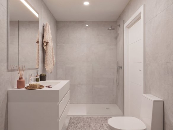 Tweede badkamer met inloopdouche, wastafelmeubel en moderne afwerking