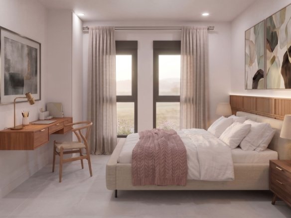 Derde slaapkamer met tweepersoonsbed, werkplek en veel natuurlijk licht