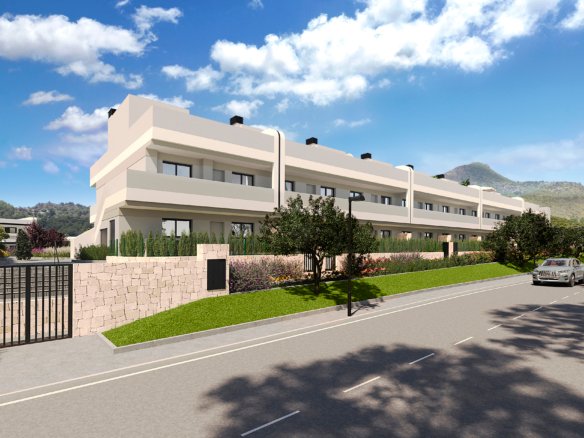 Gevelimpressie van nieuwbouw in La Manga Club met witte appartementen, glazen balustrades en omheinde tuinen