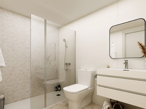 Interieurimpressie van een tweede badkamer met inloopdouche en wit wastafelmeubel bij nieuwbouw in La Manga Club