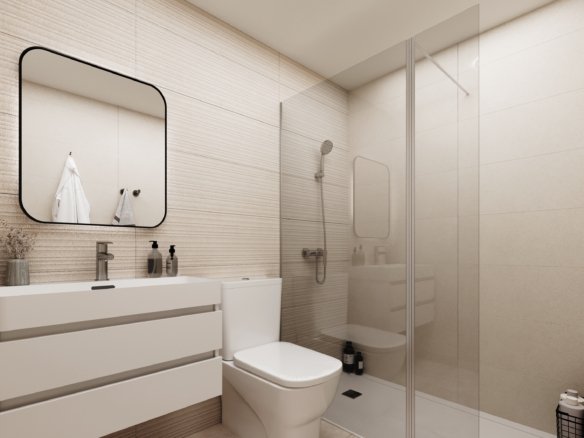 Interieurimpressie van een badkamer met glazen douchewand, wastafelmeubel en spiegel bij nieuwbouw in La Manga Club