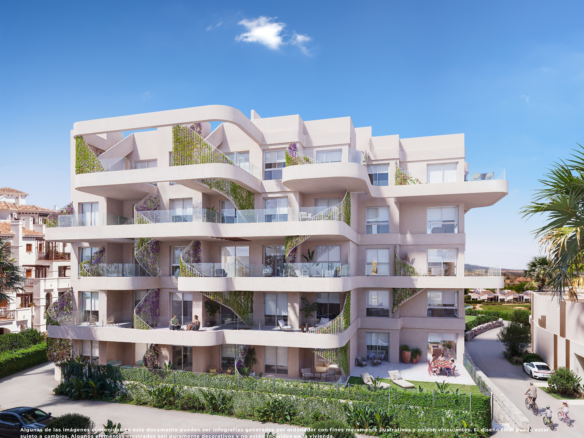 Impressie van een appartementengebouw op El Valle Golf Resort met afgeronde balkons en groene gevelaccenten.