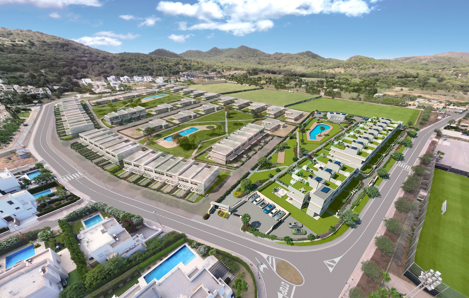 Vogelvluchtimpressie van nieuwbouw in La Manga Club met appartementen, zwembaden en tuinen tussen de heuvels