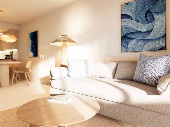 Moderne woonkamer met een bank, salontafel en kunst aan de muur.