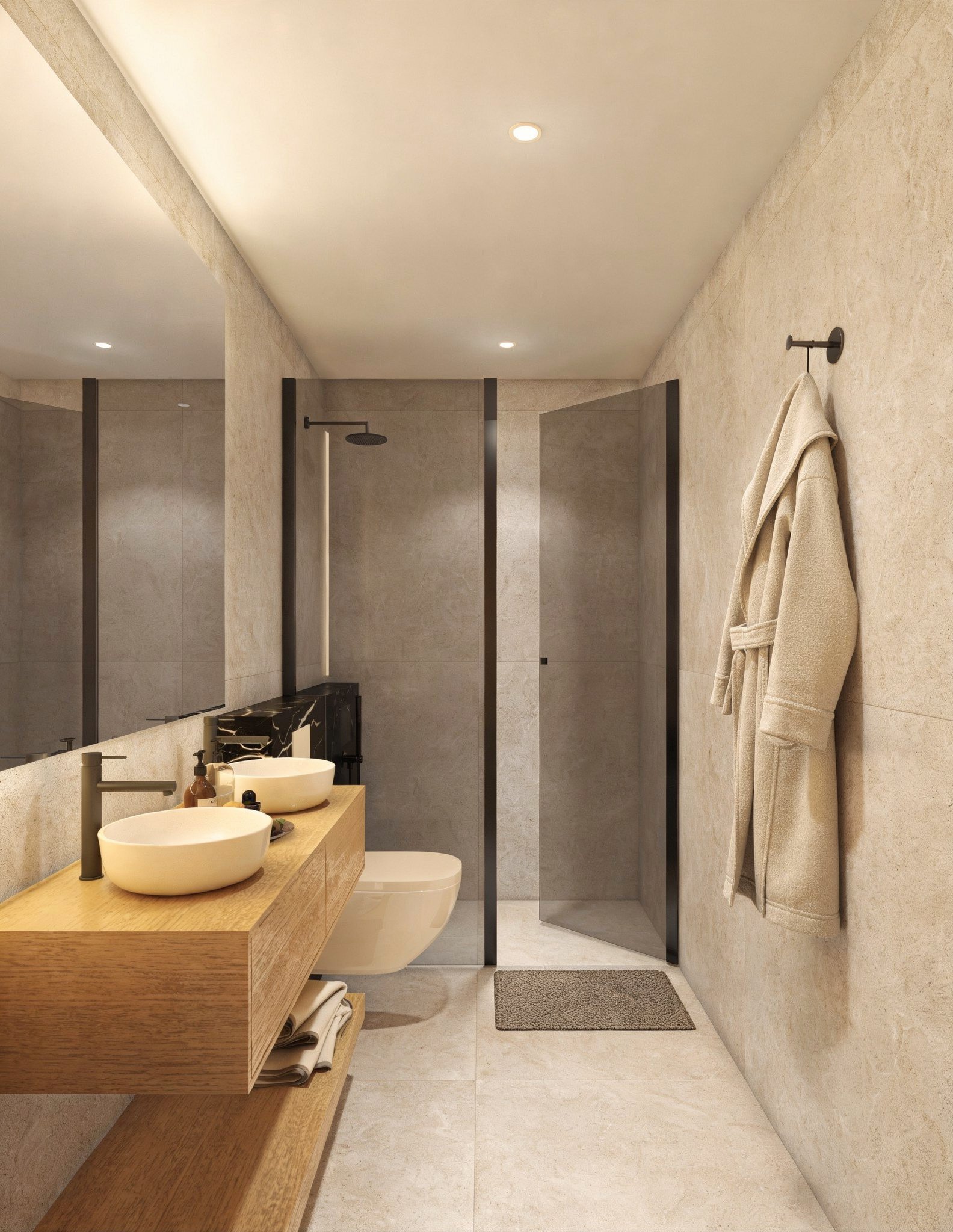 Moderne badkamer met douche, wastafels en toilet.