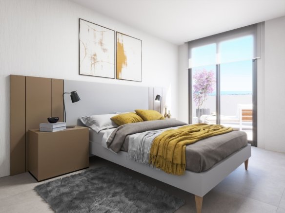 Slaapkamer met een tweepersoonsbed, nachtkastje en groot raam met zicht op een terras.