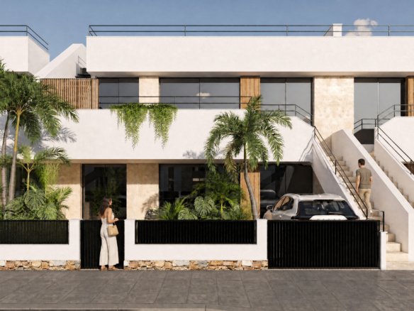 Een modern gebouw met trap en planten, met een persoon die de trap op loopt en een andere die wacht.