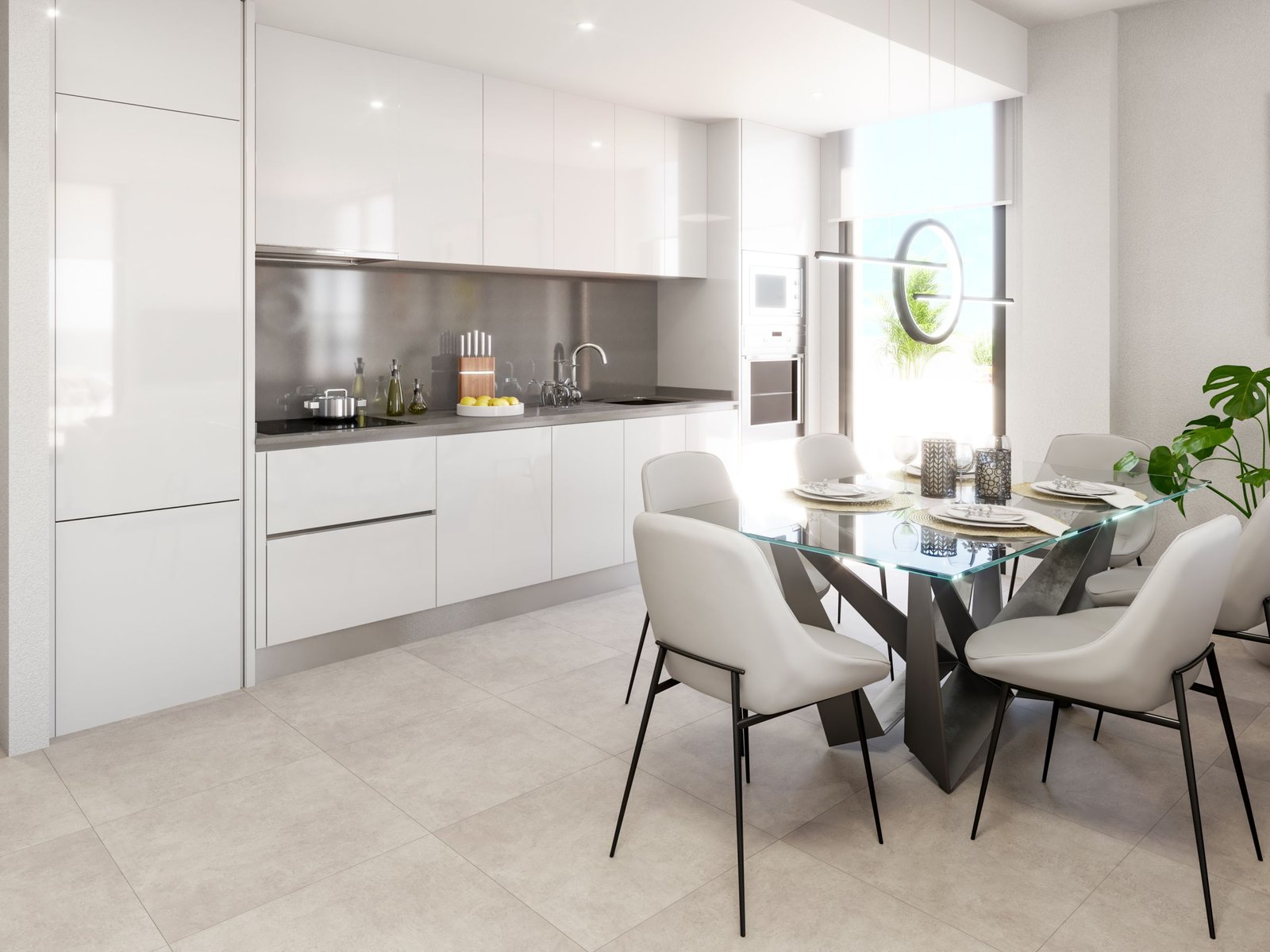 Moderne keuken met witte kasten en een eettafel met witte stoelen.