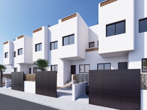 Moderne woningen met witte gevels en zwarte hekken.